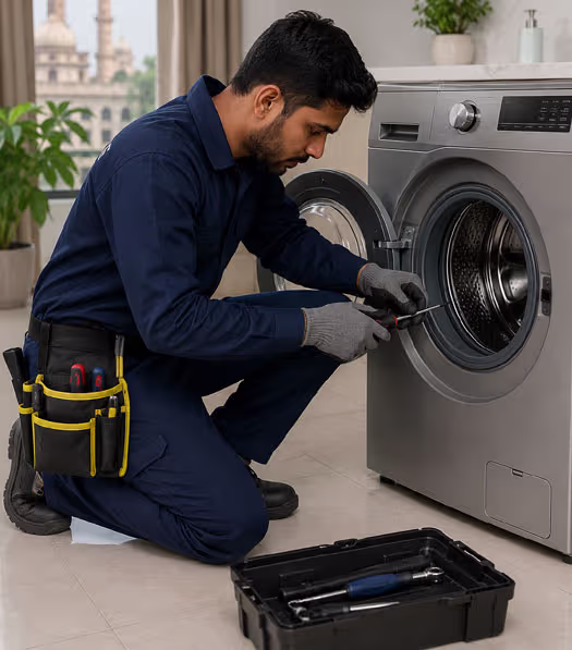 Technician repairing a front load washing machine at home in Lucknow
